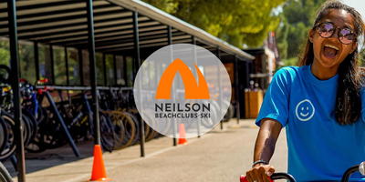 Happy employee on a bike