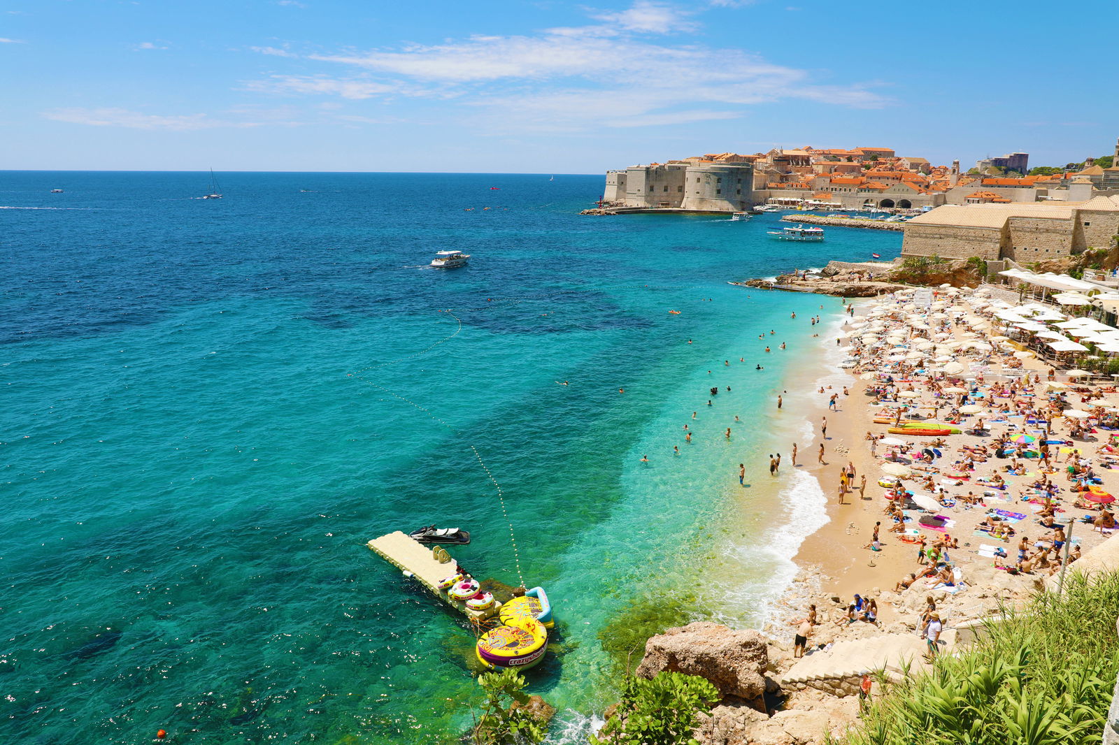 Idealistic view of Dubrovnik with beach and city on the background