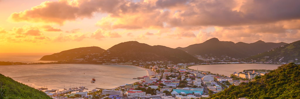 Panoramic view of philipsburg saint martin with sunset