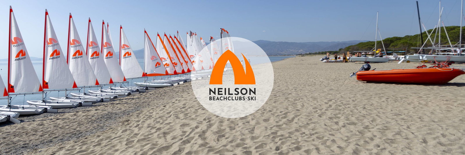Sailing boats at the beach on a sunny day
