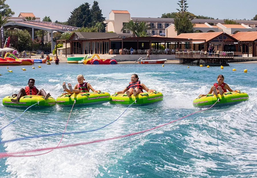 Kids at a holiday park enjoying water sports activities