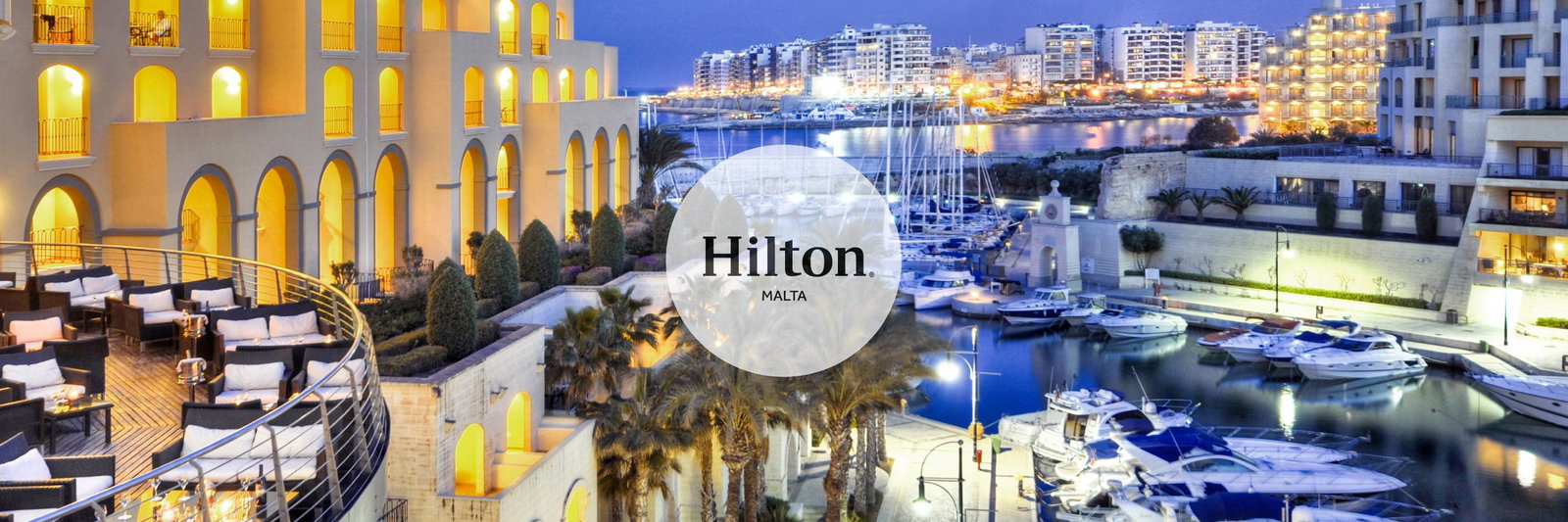 Panoramic view at night of Hilton Malta