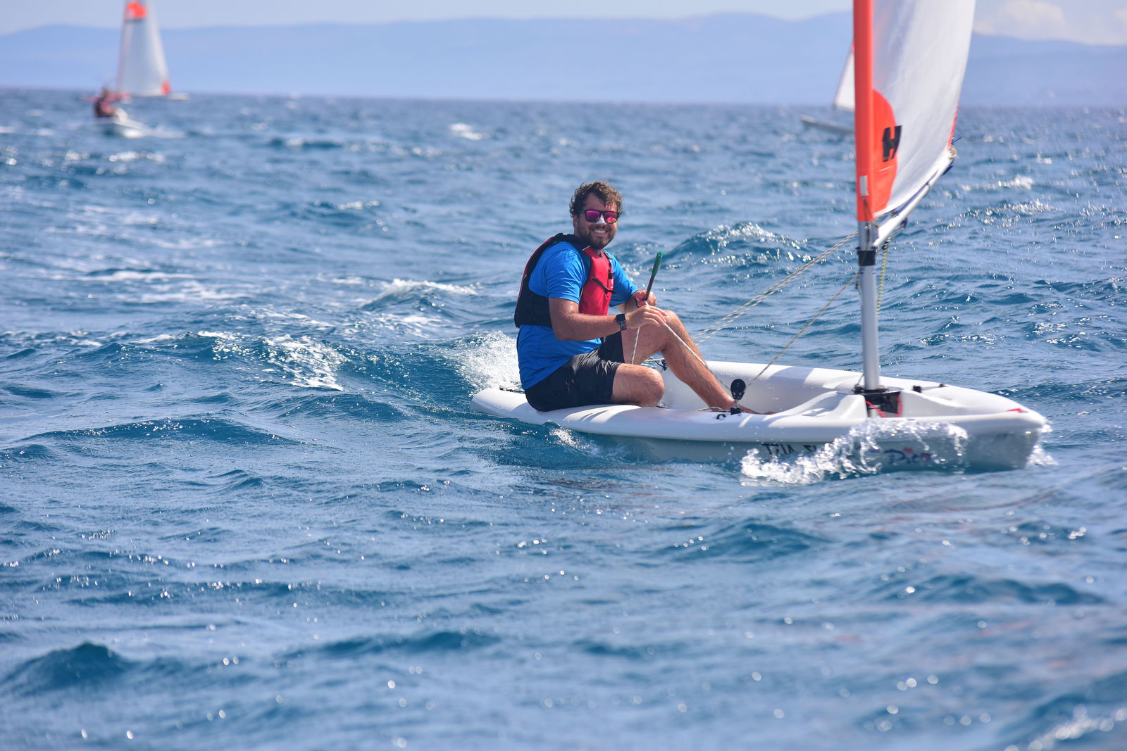 Instructor on sailboat on the sea