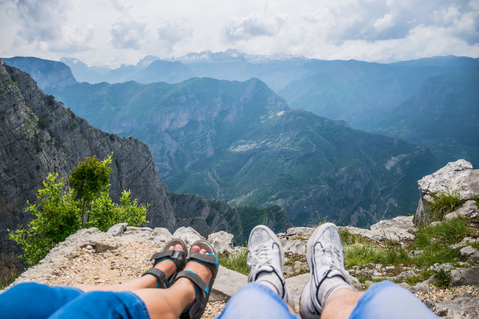 Couple resting top mountain Montenegro