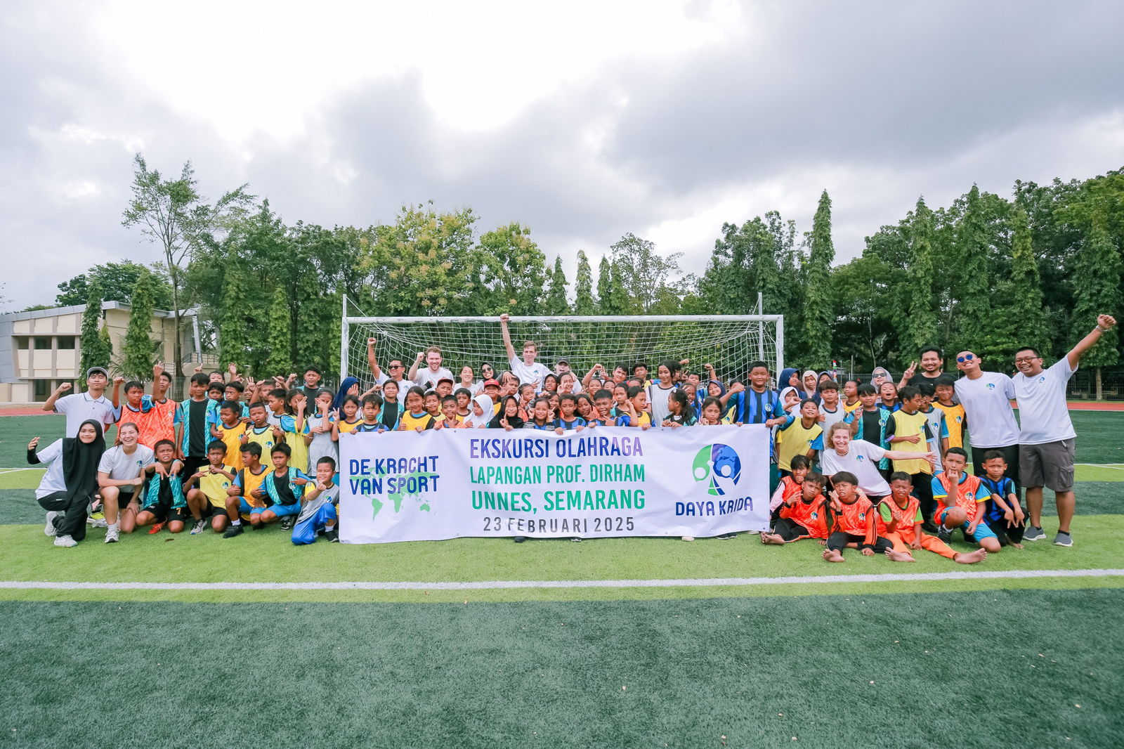 Volunteers with a banner in Indonesia