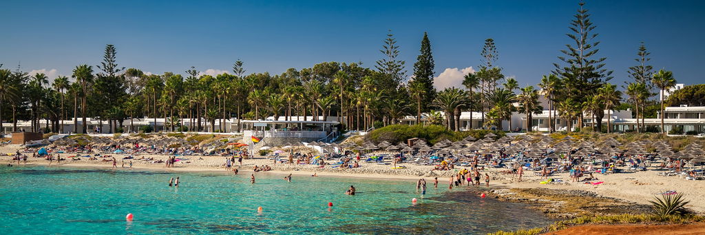 people relaxing nissi beach cyprus