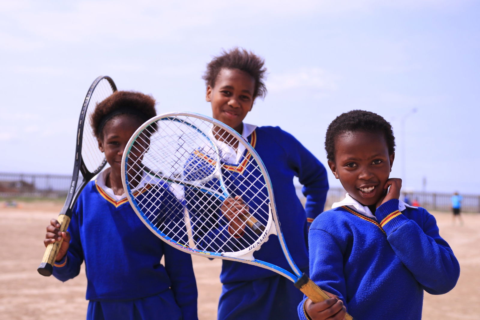 Children with a tennis racket