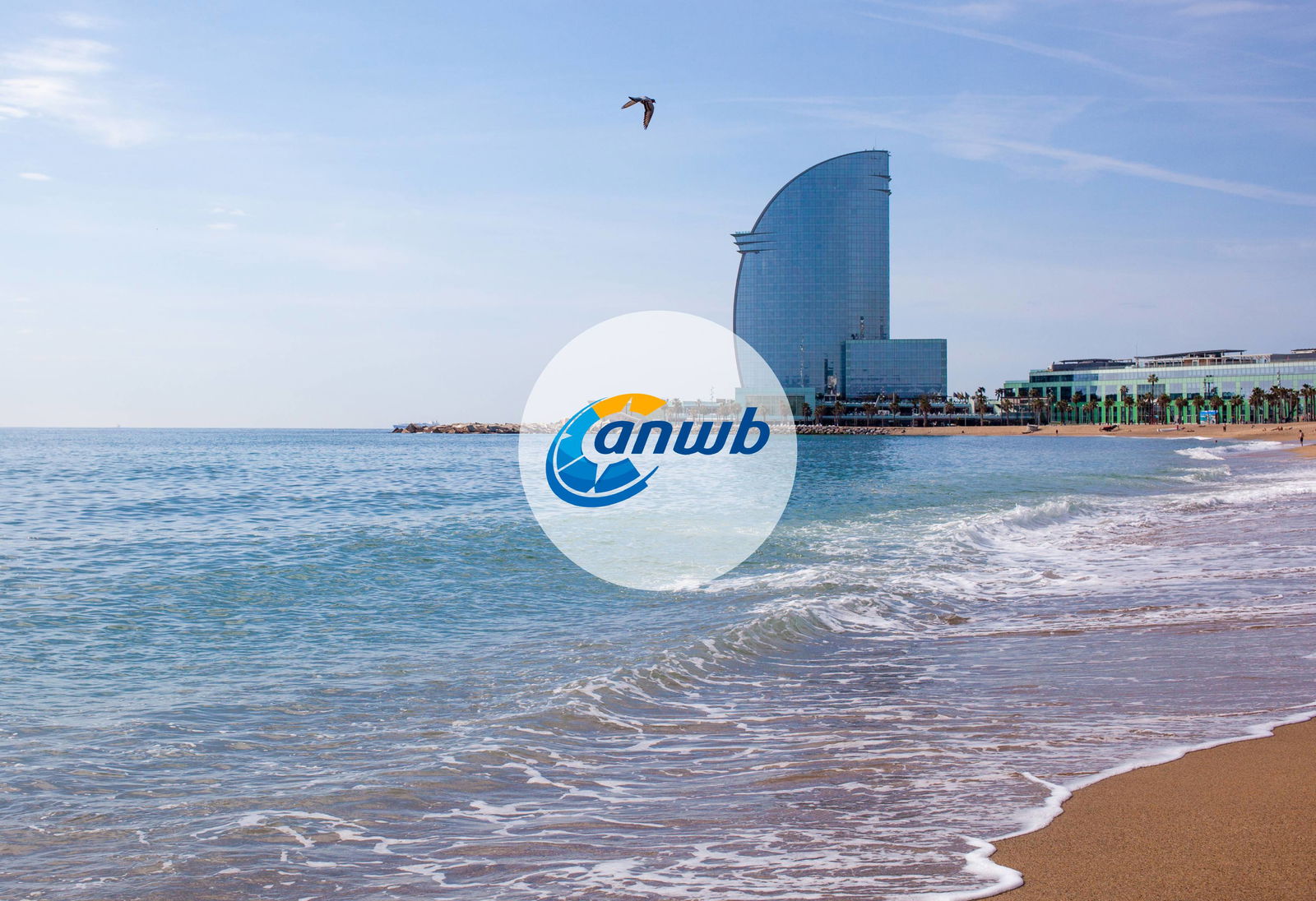 Panoramic view of beach in Barcelona with a company logo