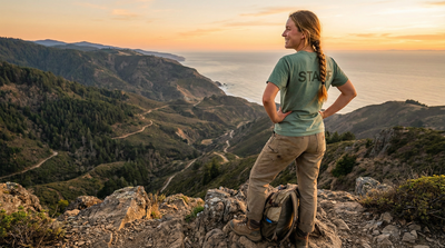 Graduate working seasonal job enjoying scenic mountain view during break from work