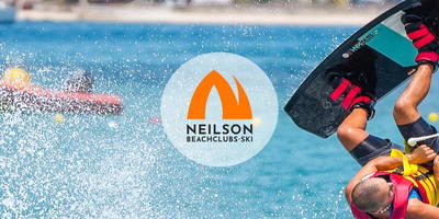 Ski instructor doing a backflip