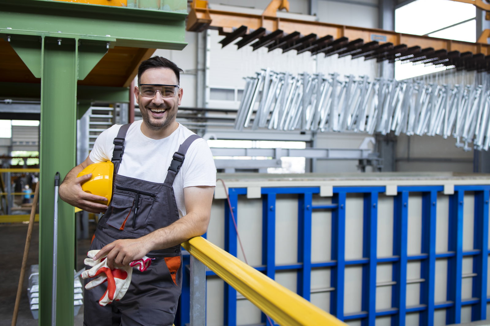 Technical worker in a factory hall