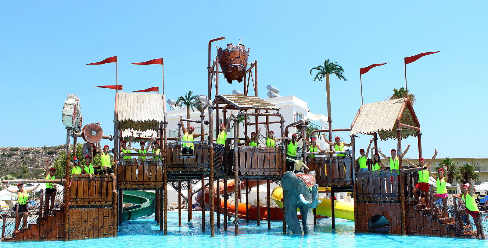 Team picture of entertainers at a swimming pool