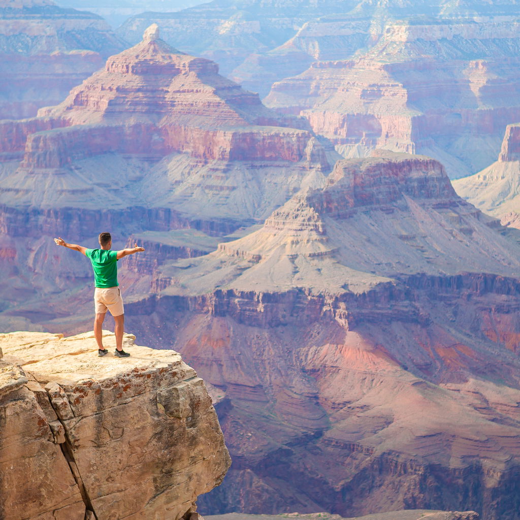 Hiker with an amazing view at grand canyon
