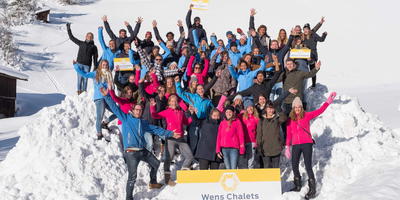 Teamfoto van chaletstaf in Oostenrijk